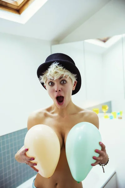 Exited Woman Covering Breasts Balloons — Stock Photo, Image