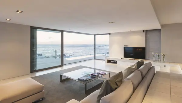 Modern Minimalist Luxury Living Room Patio Doors Open Ocean View — Stock Photo, Image