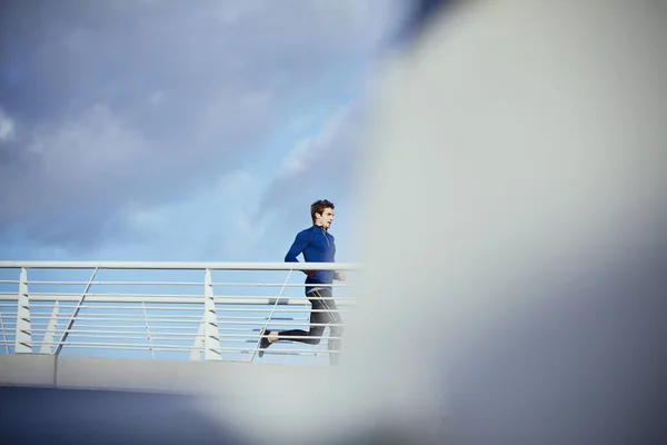 Male Runner Running Sunny Footbridge — Stock Photo, Image