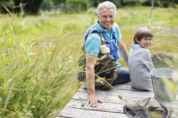 Man Fishing Grandson Wooden Dock — Stock Photo, Image