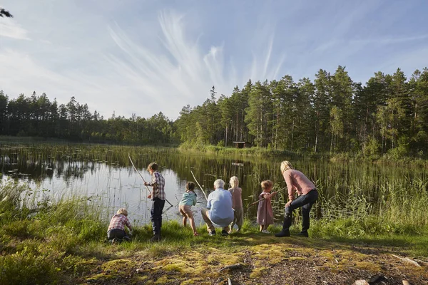 Grandparents Grandchildren Fishing Sunny Lakeside Woods — Stock Photo, Image