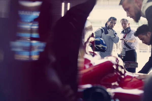 Manager Formula One Race Car Driver Talking Repair Garage — Stock Photo, Image