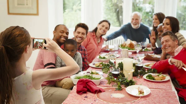 Girl Camera Phone Photographing Multi Ethnic Family Christmas Dinner Table — Stock Photo, Image