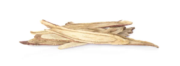 Beyaz arka plan üzerinde izole dilim meyan kökü kök.