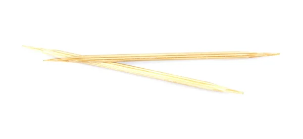 beyaz zemin üzerine ahşap kürdan ayır