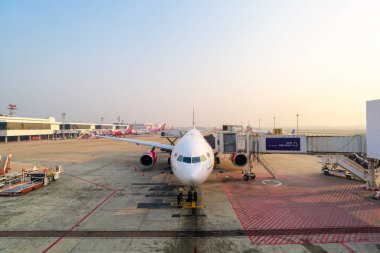 Havaalanı rampa hizmet için ticari bir uçak iniş Don Mueang Uluslararası Havaalanı Bangkok, Tayland için.