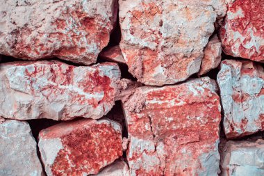 Kırmızı Antik Taş veya Kaya Duvar.Eski taş duvar doku arka plan.