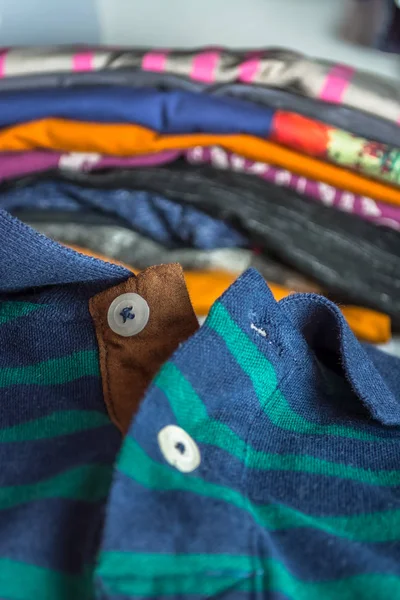 View of a polo shirt, casual green and blue colors