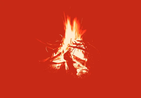 Fire of a night fire on a red uniform background