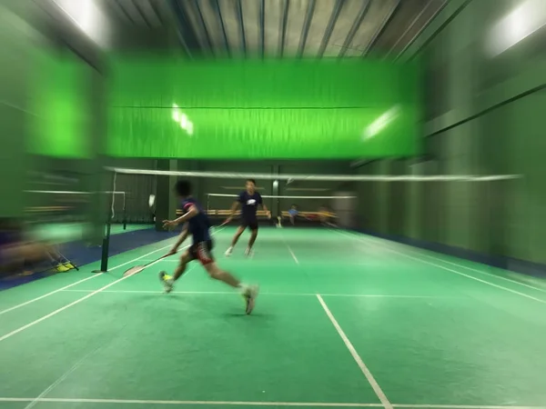 Movimento de zoom desfocado de badminton indoor match . — Fotografia de Stock