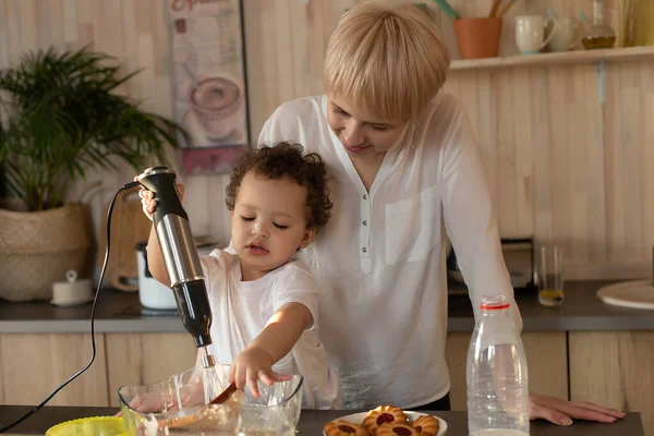 the Happy mother and son prepare to eat