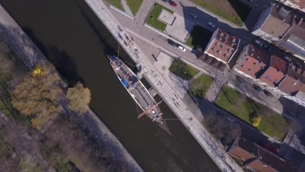 Aerial Rotating Top View Tall Ship Moored European Old Town — Stock Video