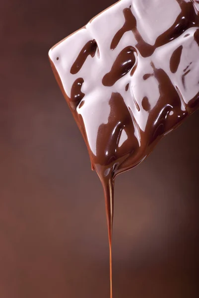 Delicious melted dark chocolate — Stock Photo, Image