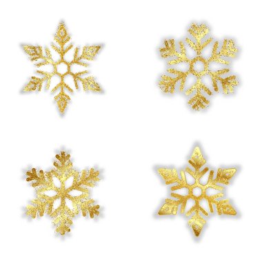 Farklı, gölgeli altın kar taneleri.