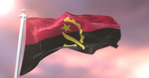 Angola Vlag Zwaaien Wind Het Langzaam Zonsondergang Lus — Stockvideo