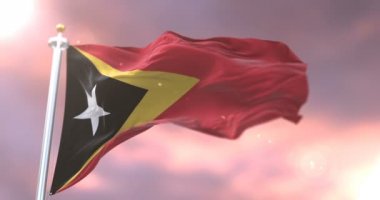 Yavaş, döngü içinde gün batımında, Doğu Timor sallayarak bayrak Rüzgar