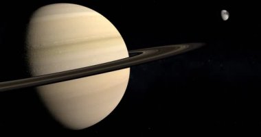 Uydu Iapetus çevresinde yörüngede ile Satürn gezegeni
