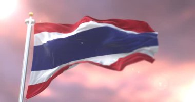 Yavaş, döngü içinde gün batımında, Tayland sallayarak bayrak Rüzgar