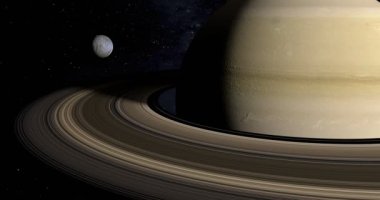 Satürn gezegenin etrafında yörüngede Mimas uydu