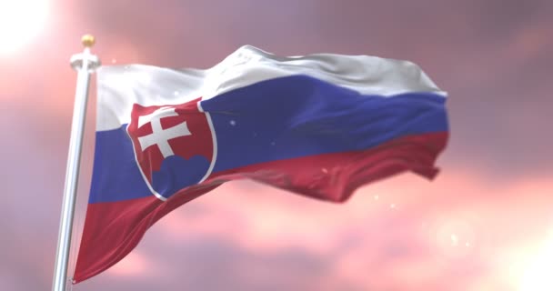 Flag of Slovakia waving at wind in slow at sunset, loop