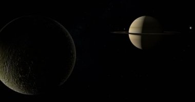 Uzayda etrafında dönen Rhea, Satürn ün ay, uydu