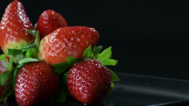 Strawberries Fruit Gyrating Black Background — ストック動画