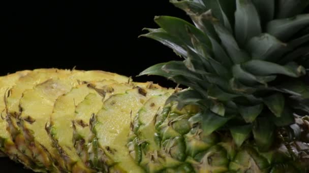 Natural Pineapple Fruit Cut Slices Gyrating Black Background — Stock Video