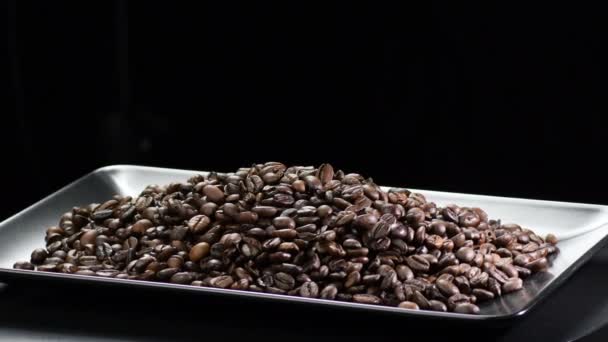 Coffee Grains Gyrating Black Tray Black Background — 图库视频影像