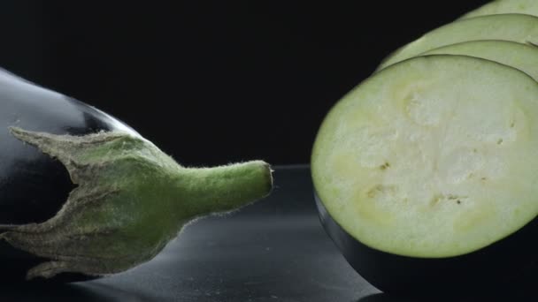 Natural Raw Eggplant Cut Gyrating Black Background Solanum Melongena — 비디오