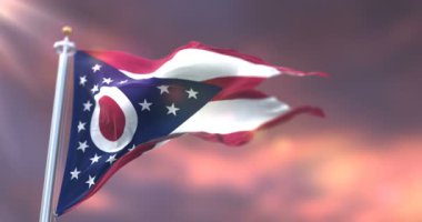 Flag of Ohio state at sunset, region of the United States of America - loop