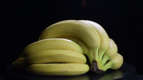 Bunches Bananas Fruit Gyrating Black Background — Stock Video