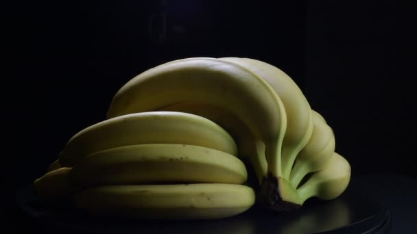 Fruta Del Plátano Sobre Fondo Negro — Vídeos de Stock