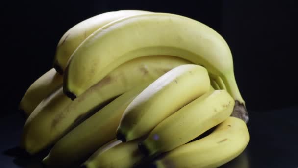 Fresh Bananas Bunch Gyrating Black Background — 비디오