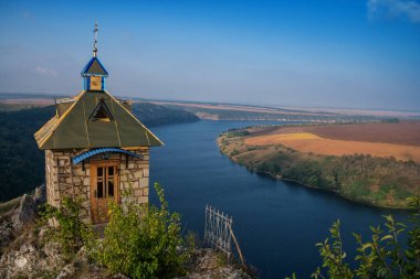 Scenic panorama view from the hill to the reservoir on the Dniester river, Ukraine.  clipart