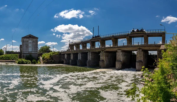 Old hydroelectric station. The flow of water. Ukraine.