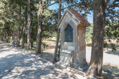 Rhodes Island, Greece. 05/28/2018. The path leading to gigantic cross near Monastery of Filerimos. Christ's passion. Wayside Shrine. Europe.	