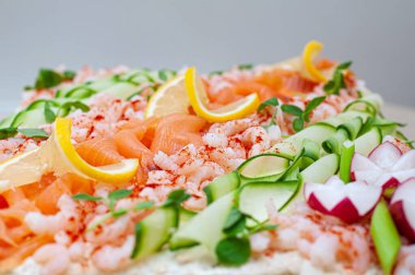Smorgastarta, Swedish sandwich like cake or sandwich torte is a dish with seafood ingredients like salmon, shrimps and prawns. clipart