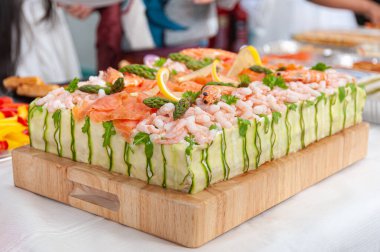 Smorgastarta, Swedish sandwich like cake or sandwich torte is a dish with seafood ingredients like salmon, shrimps and prawns. clipart