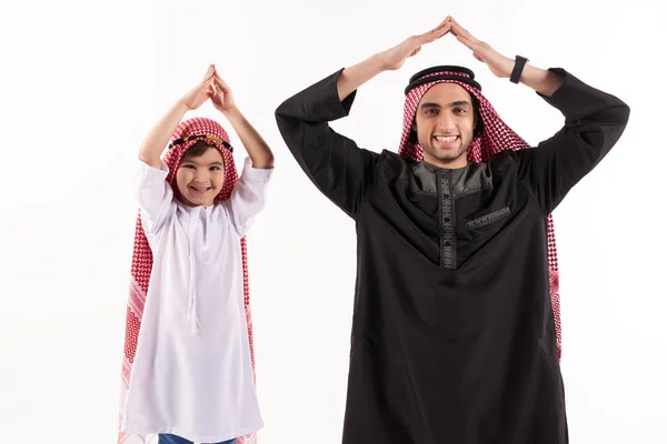 Arabové otce a malého syna v národní oděv — Stock fotografie