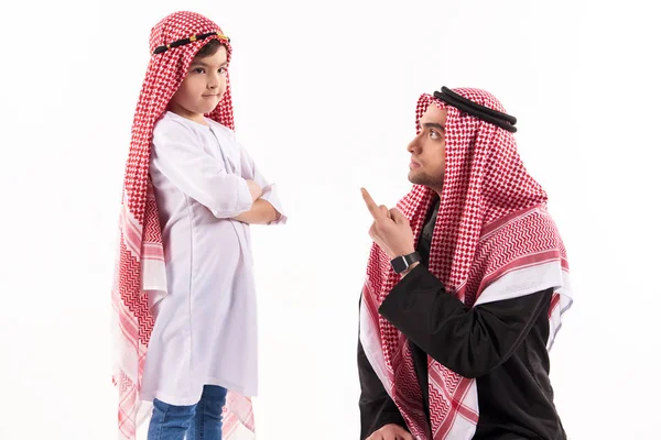 Arab dissatisfied father scolds son in ethnic — Stock Photo, Image