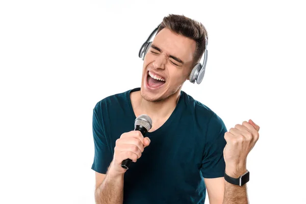 Jonge knappe kerel hoofdtelefoon zingen karaoke — Stockfoto