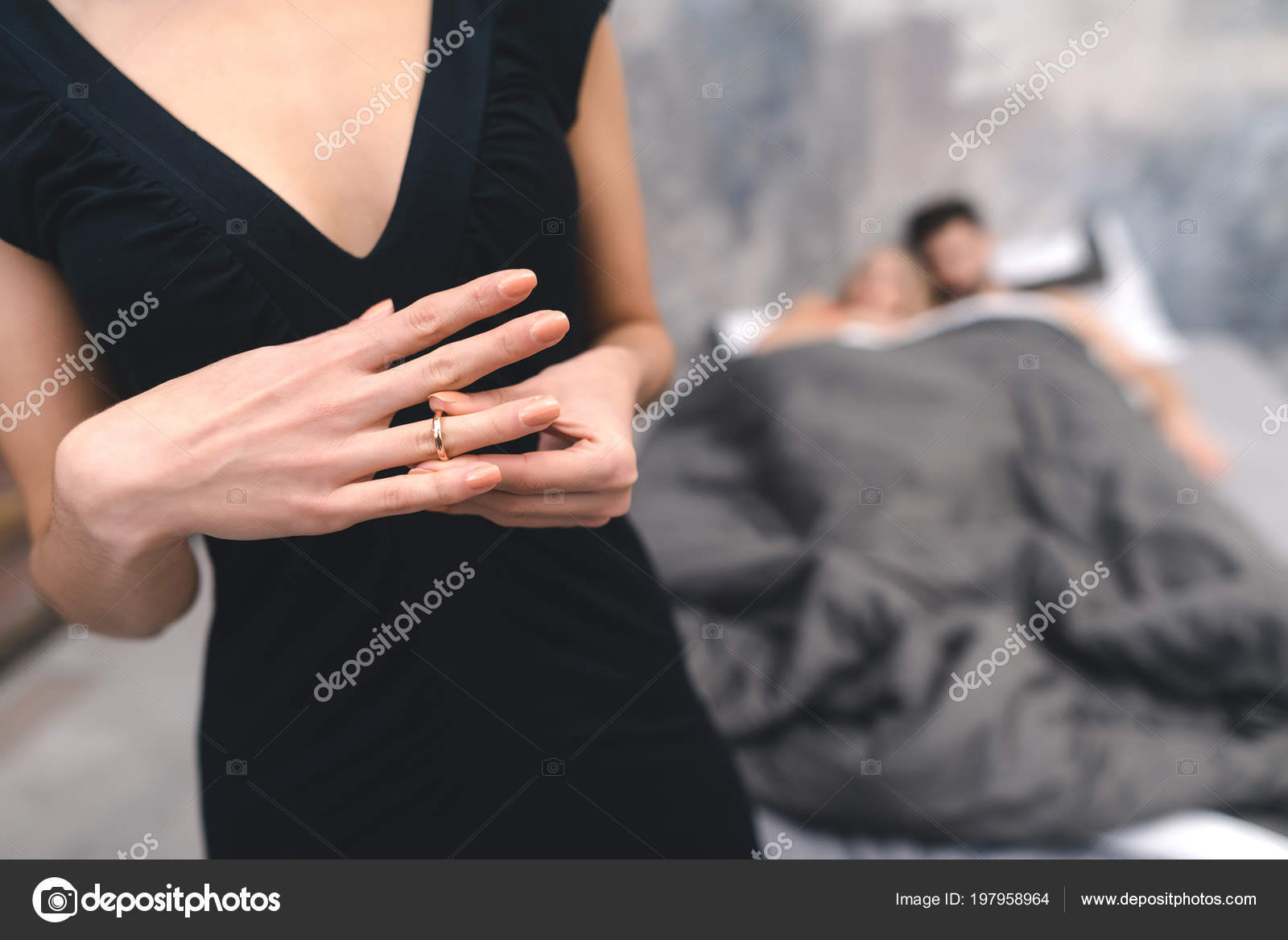 Close up of woman hand removes wedding ring Stock Photo by ©stockveres.gmail 197958964