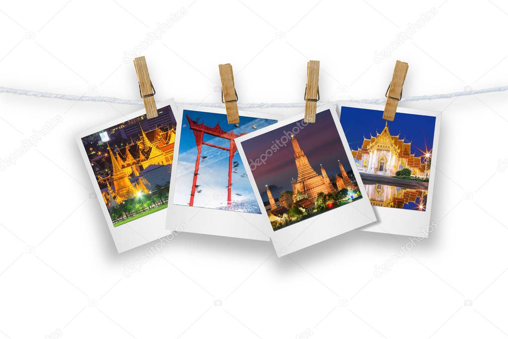 Blank photo frame  with clothespin hanging, photo landmark of Bangkok, Isolated on white with clipping path.