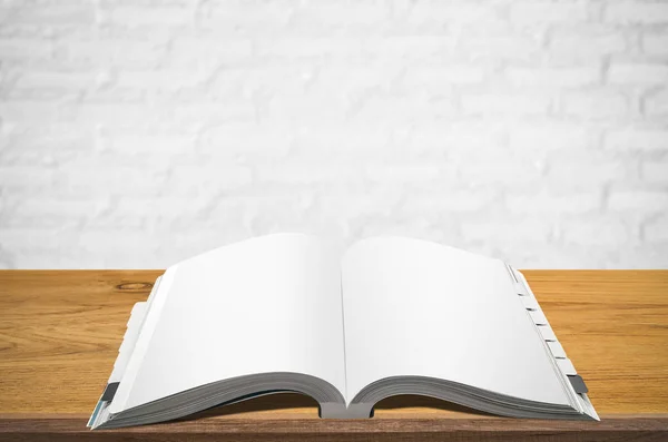 Open Book Wooden Table Blurred Whit Wall Background — Stock Photo, Image