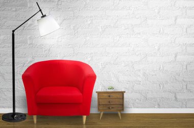 Loft oturma odası ve beyaz duvar önünde kırmızı koltuk.