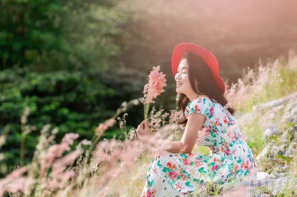 Beautiful Woman Natural Flowers Her Dress Red Hat Sitting Pink — Stock Photo, Image