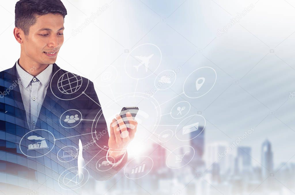 Double exposure of Businessman holding smartphone, Concept communication network digital technology via internet wireless.