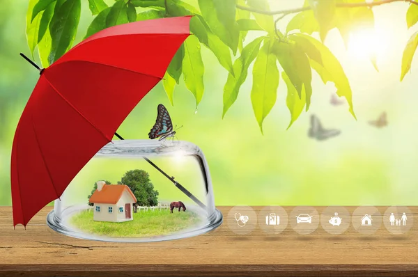 Property Insurance Toy House Glass Dome Wooden Floor Red Umbrella — Stock Photo, Image