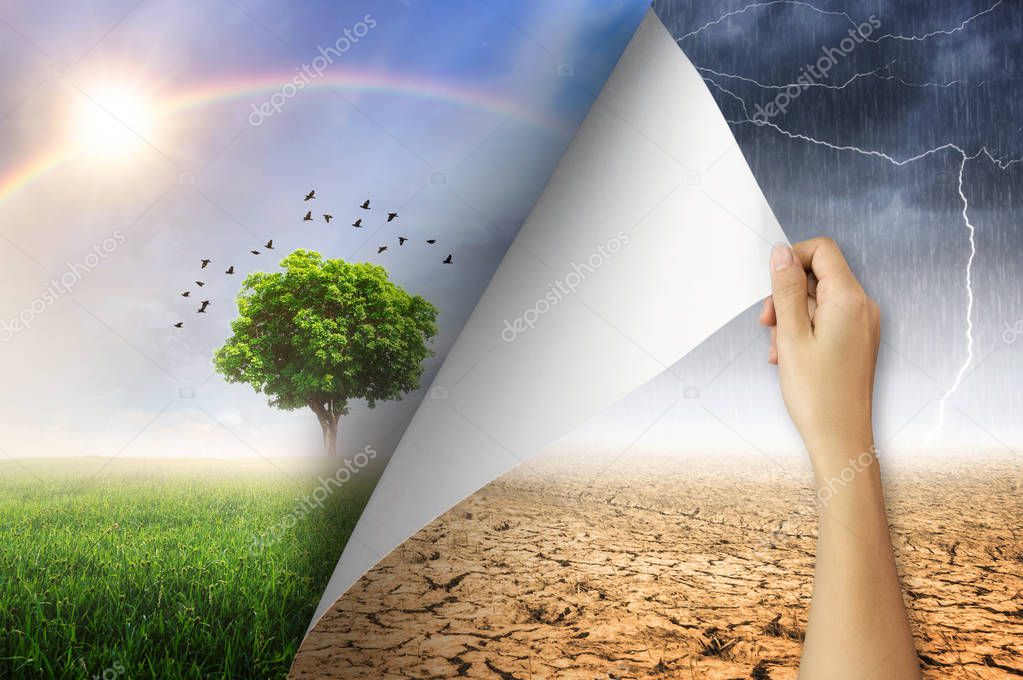 Change concept, Woman hand turning arid and rain with lightning storm environment paper page to good environment.
