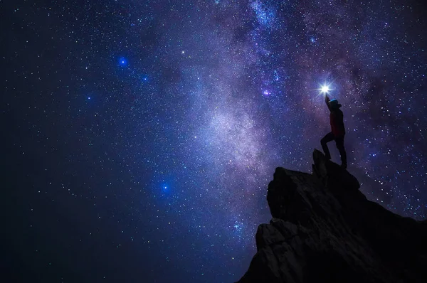 Silhouette Climber Backpacker His Hand Held Light High His Head — Stock Photo, Image